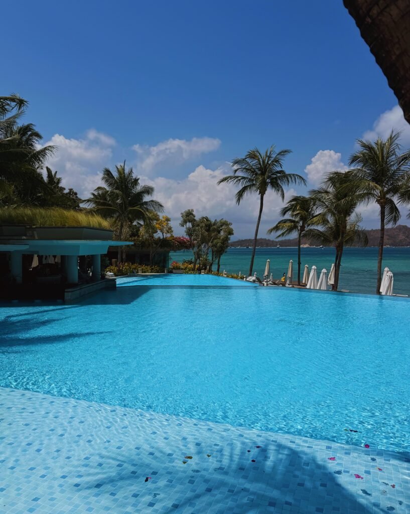 Ayana Komodo swimming pool at sunset